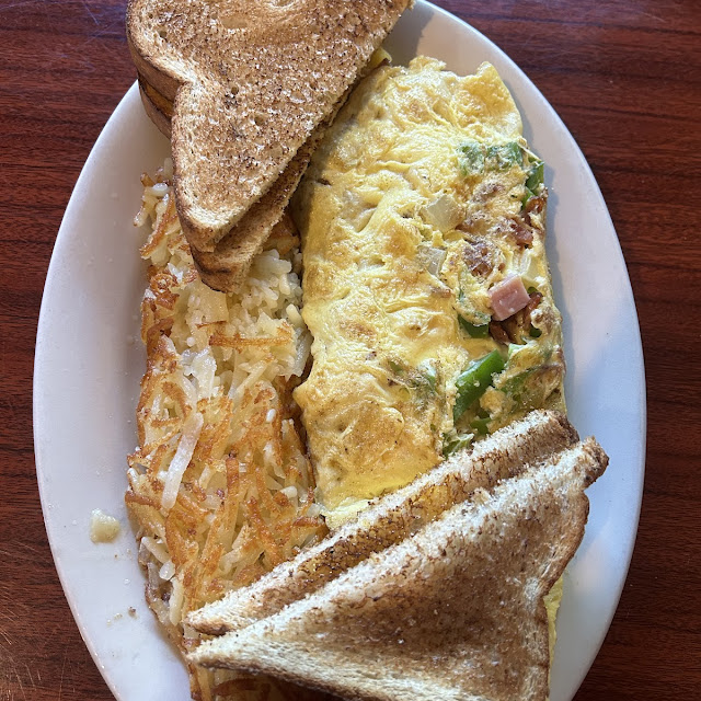 2 Pancakes or French Toast with 2 Eggs