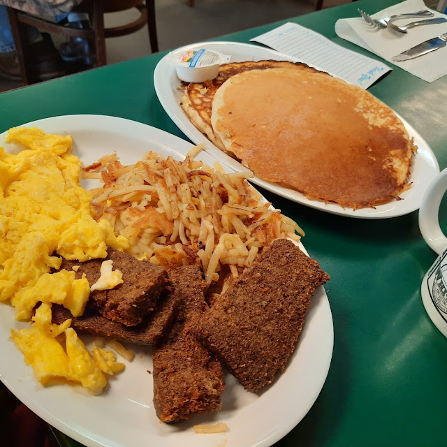 Eggs Hash Browns Livermush and Hotcakes