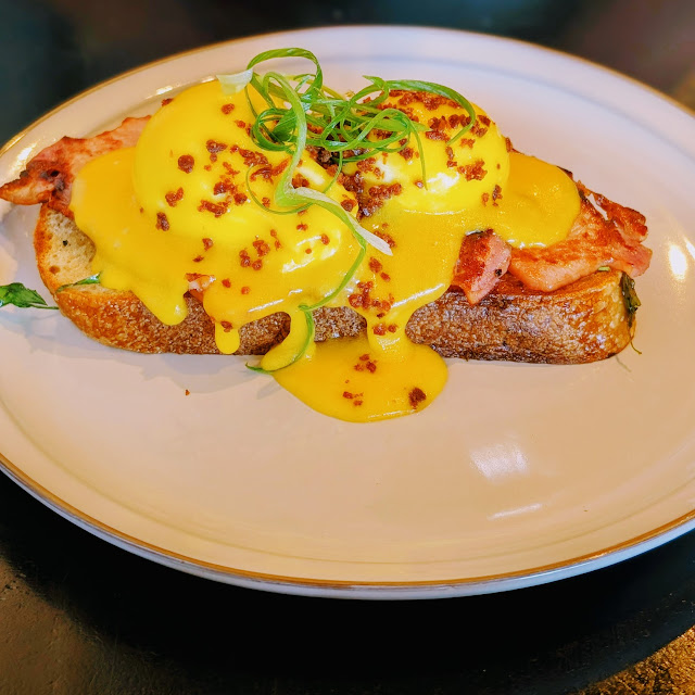 Eggs Benedict with Cardamom Hollandaise on Sourdough with Bacon Smoked Salmon Option