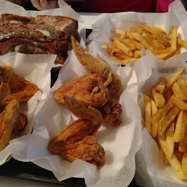 Six Chicken Wings Two Pork Ribs Double Order of Fries 22
